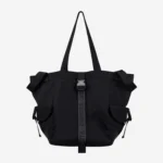 Torba shopper Kubota Pockets czarna. Przejdź do kategorii torby unisex, aby odkryć wszystkie modele.